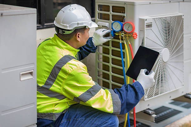 Professional Air Duct Cleaning technician working in Marion, KY
